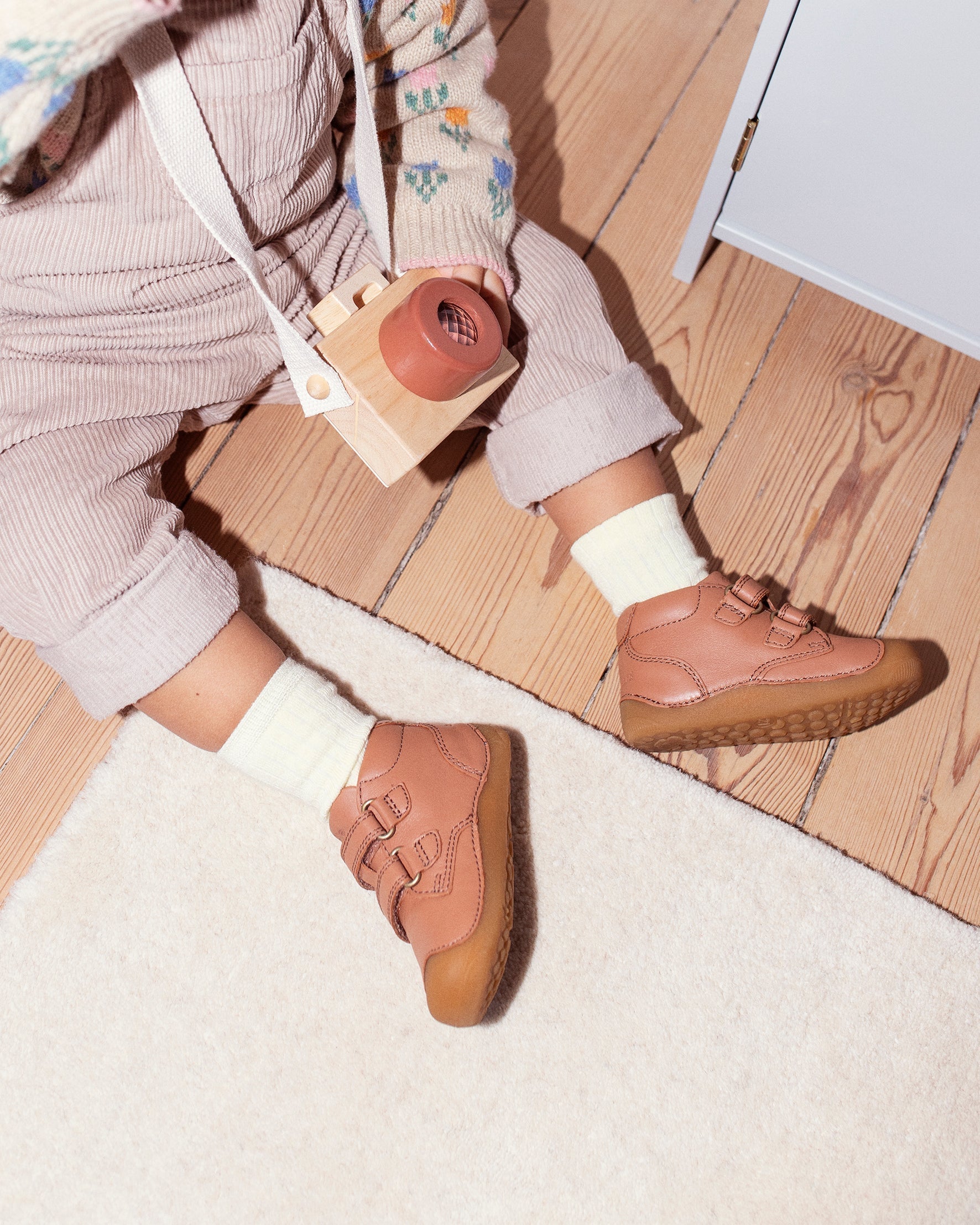 Petit børnesko – Ikonet for de første skridt